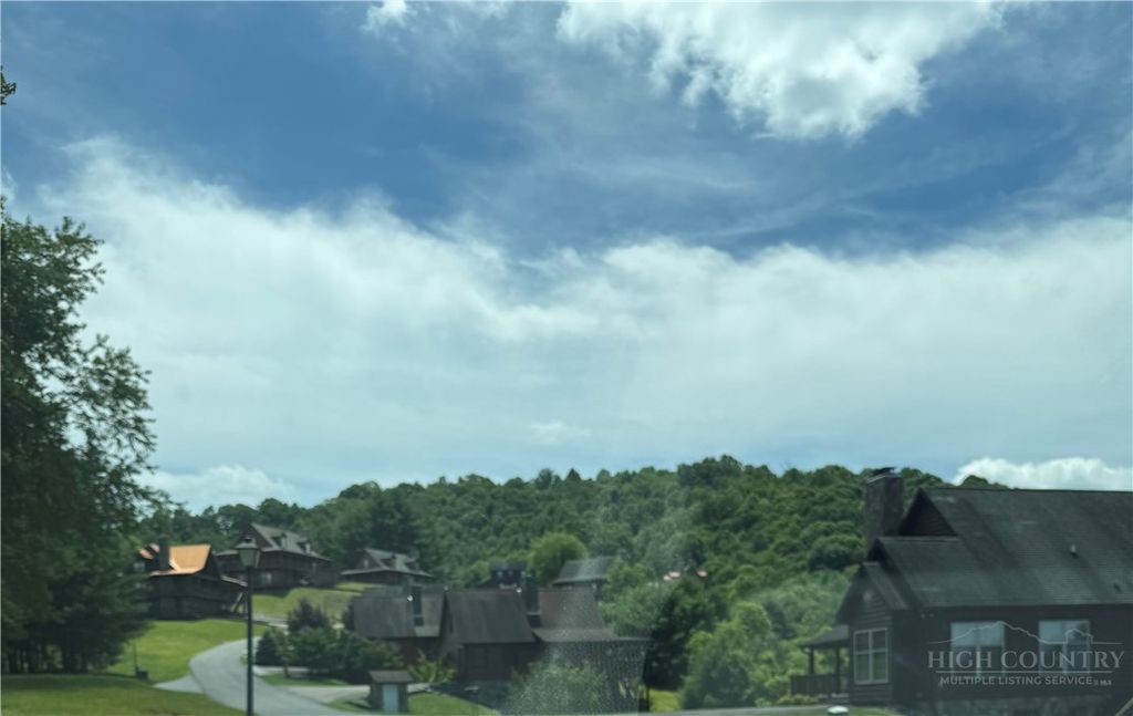 Photo of TBD Deerwood Road #58, Piney Creek, NC 28675 (MLS # 262959)