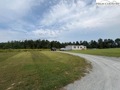 Photo of 111 Wilderness Family Trail, Ennice, NC 28623 (MLS # 257944) Photo of 111 Wilderness Family Trail, Ennice, NC 28623 (MLS # 257944)