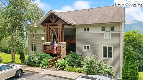 Photo of 143 Hawks Peak Lane #122, Seven Devils, NC 28604 (MLS # 257564)