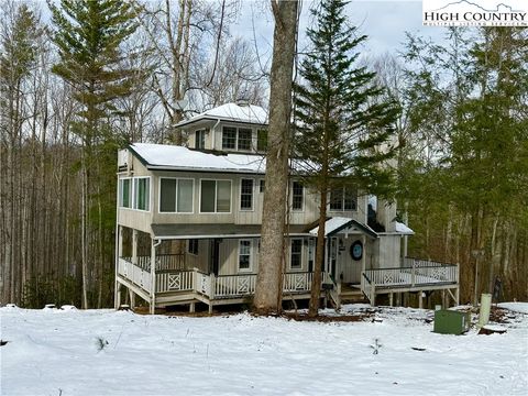 Photo of 310 Turkey Knob Trail, Fleetwood, NC 28626 (MLS # 259317)