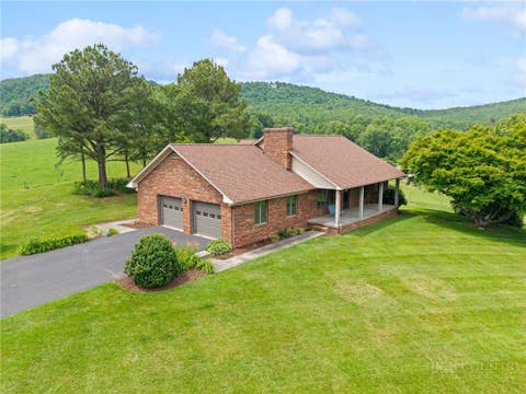 Photo of 1701 NC HIGHWAY 16 N, Crumpler, NC 28617 (MLS # 262359)