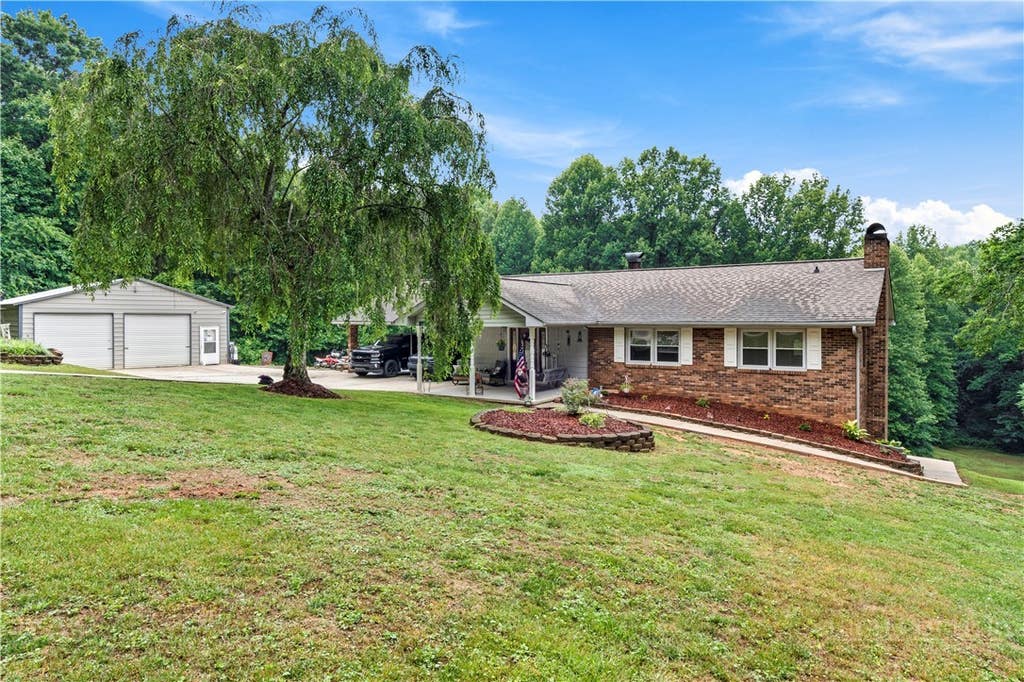 Photo of 303 Alexander Drive, North Wilkesboro, NC 28659 (MLS # 262575)