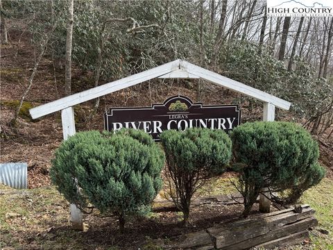 Photo of 45 Happy Ridge Road, Piney Creek, NC 28631 (MLS # 260680)