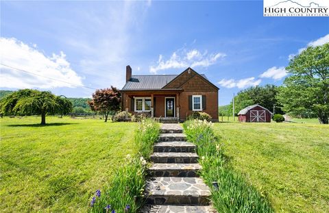 Photo of 3703 N US Highway 221, Crumpler, NC 28617 (MLS # 255854) Photo of 3703 N US Highway 221, Crumpler, NC 28617 (MLS # 255854)