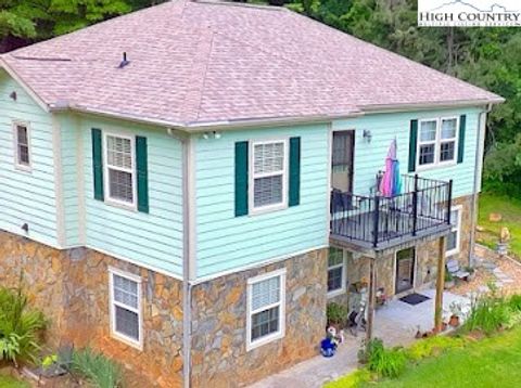 Photo of 424 McKinley Ridge Road, Lansing, NC 28643 (MLS # 257635) Photo of 424 McKinley Ridge Road, Lansing, NC 28643 (MLS # 257635)