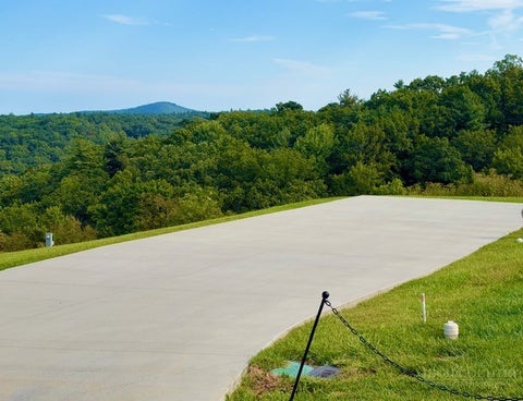 Photo of 274 Mitchells Gorge, Roaring Gap, NC 28668 (MLS # 264437)