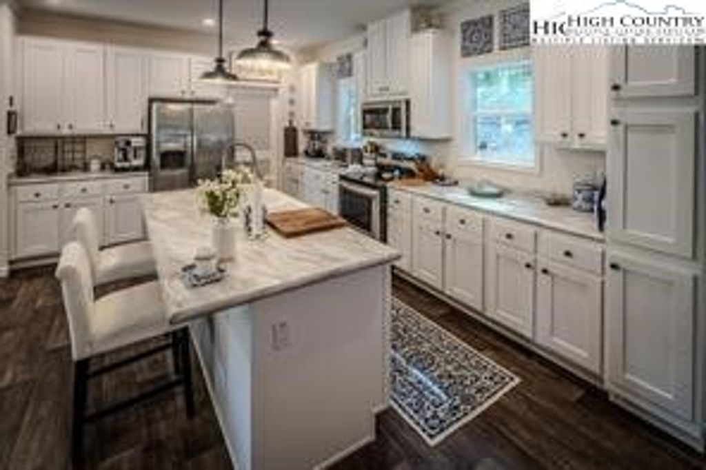 Photo of 211 &amp; 213 Wild Daisy Lane, Banner Elk, NC 28604 (MLS # 260100)