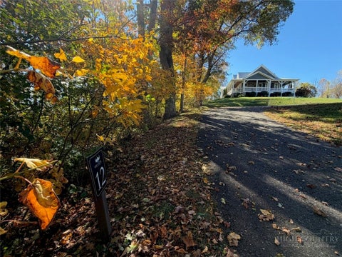 Photo of Lot 12 Olde Stone Ridge, Crumpler, NC 28617 (MLS # 265020)