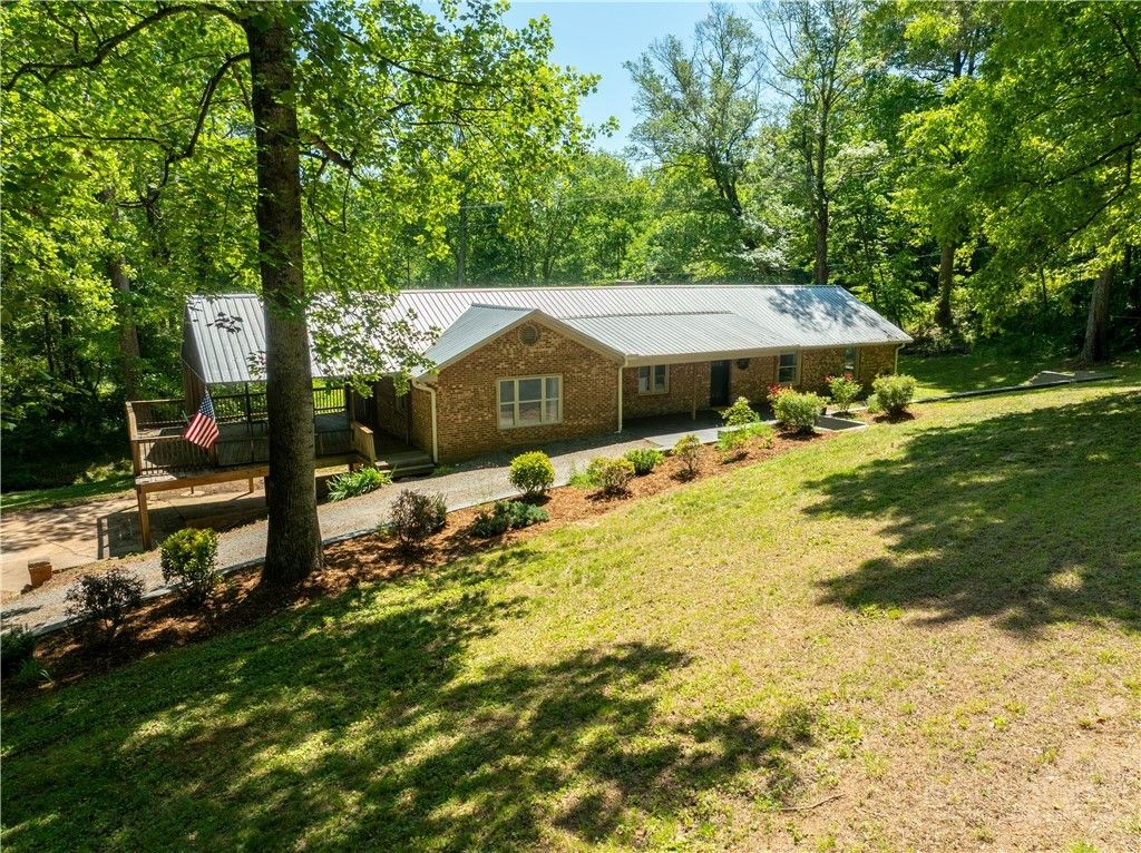 Photo of 142 Pioneer Road, Harmony, NC 28634 (MLS # 262129)
