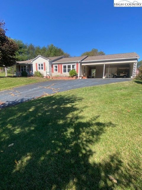 Photo of 453 Smith Acres Road, Ennice, NC 28623 (MLS # 258453)