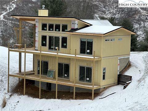 Photo of 19 Cozy Cabin Circle, Piney Creek, NC 28663 (MLS # 259433)