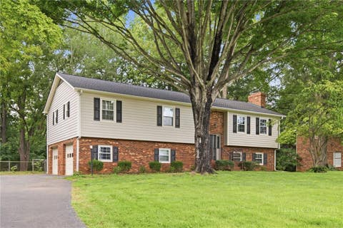 Photo of 436 Peace Haven Road, Winston Salem, NC 27103 (MLS # 263878)