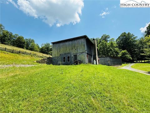 Photo of 201 Colt Creek Rd, Lansing, NC 28643 (MLS # 256211) Photo of 201 Colt Creek Rd, Lansing, NC 28643 (MLS # 256211)