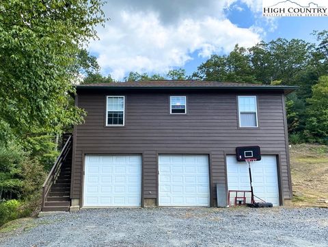 Photo of 413 Grandpas Farm Road, Fleetwood, NC 28626 (MLS # 259919)