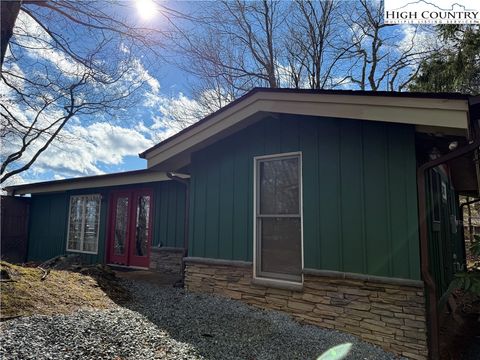 Photo of 280 Chinkapin Ridge, Seven Devils, NC 28604 (MLS # 259189)