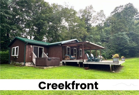 Photo of 144 S Flatwoods Road, Creston, NC 28615 (MLS # 263800)