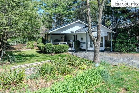 Photo of 153 Snowshoe Loop, Newland, NC 28657 (MLS # 254571) Photo of 153 Snowshoe Loop, Newland, NC 28657 (MLS # 254571)