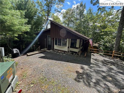 Photo of 140 Ash Loop, Newland, NC 28657 (MLS # 257850) Photo of 140 Ash Loop, Newland, NC 28657 (MLS # 257850)