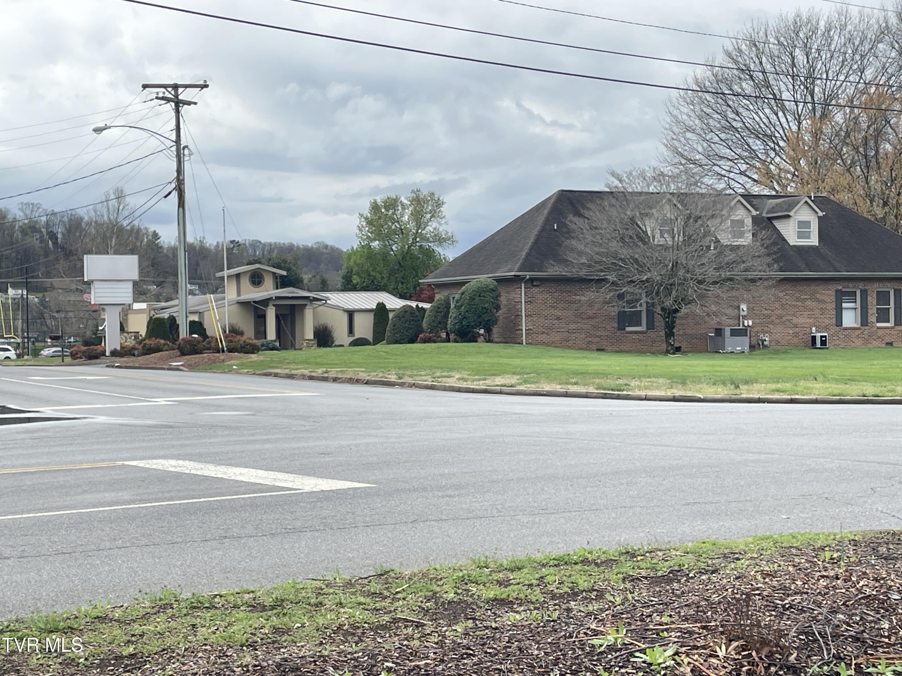 111 & 113 W Elk Ave/Charlie Robinson