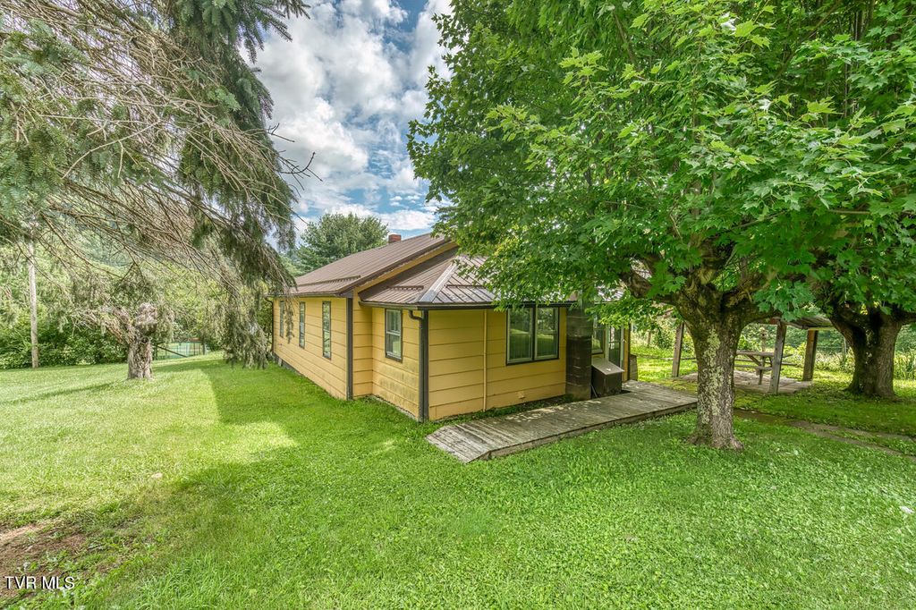 Photo of 427 Cove Creek Road, Roan Mountain, TN 37687 (MLS # 9985728)