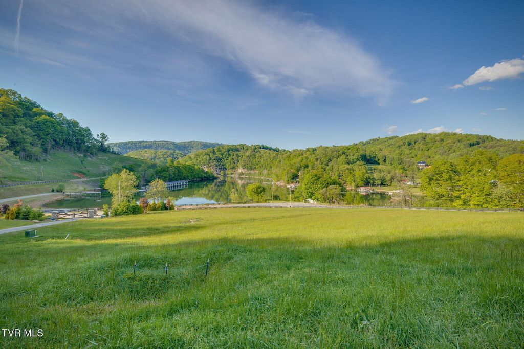 Photo of Tbd Cowan Town &amp; Eagle Ridge Pkwy Road, Butler, TN 37640 (MLS # 9994942)
