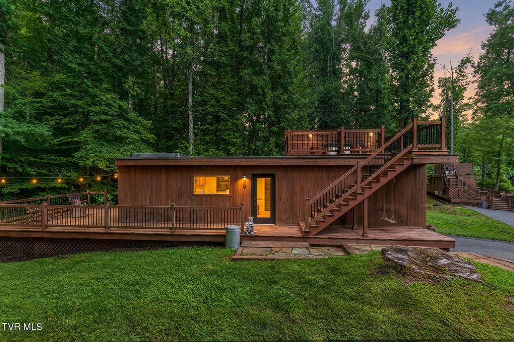 Photo of 154 State Highway 143, Roan Mountain, TN 37687 (MLS # 9999435)