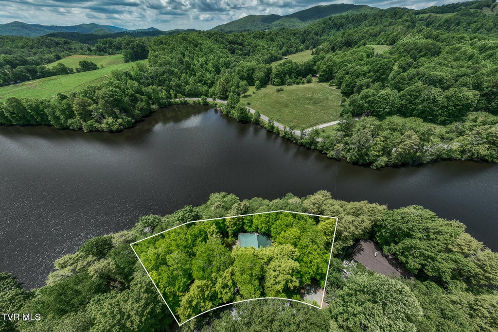 Photo of 206 Ripshin Lake Road, Roan Mountain, TN 37687 (MLS # 9996394)