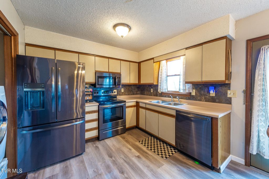 Photo of 348 River Road #B1, Bluff City, TN 37618 (MLS # 9990119)