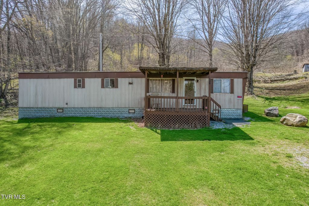 Photo of 119111 Hughes Hollow, Roan Mountain, TN 37687 (MLS # 9994009)