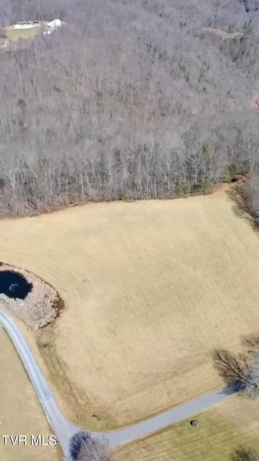 Photo of Tbd Lockhart Flats Loop, Clintwood, VA 24228 (MLS # 9992143)