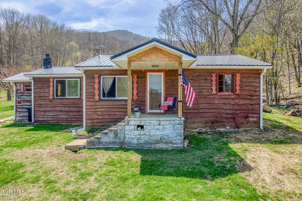 Photo of 119 Hughes Hollow Road, Roan Mountain, TN 37687 (MLS # 9994671)