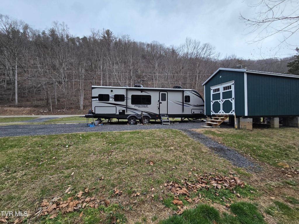 Photo of 7589 Roan Creek Road, Butler, TN 37640 (MLS # 9990158)