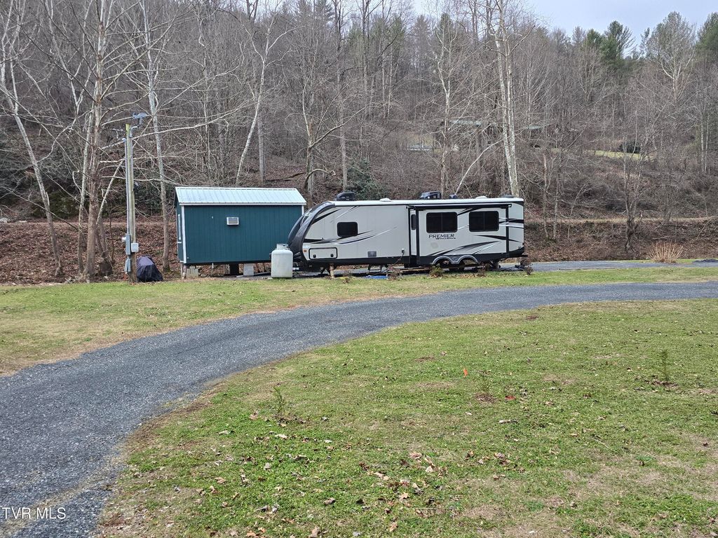 Photo of 7589 Roan Creek Road, Butler, TN 37640 (MLS # 9990158)