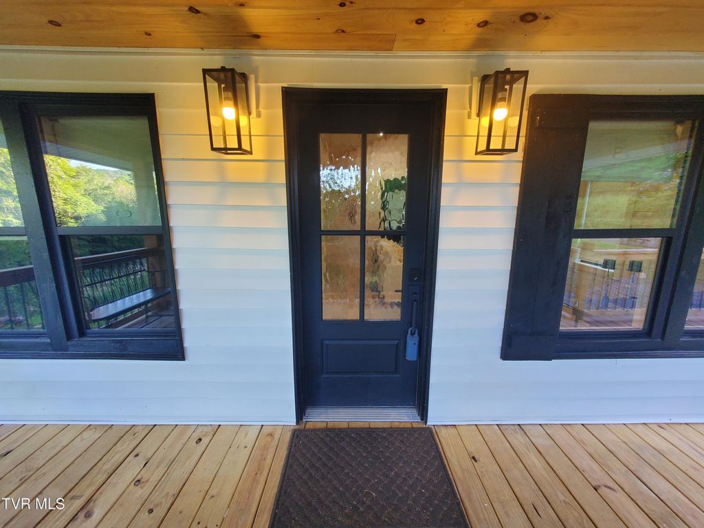 Photo of 673 Hampton Creek Road, Roan Mountain, TN 37687 (MLS # 9996329)