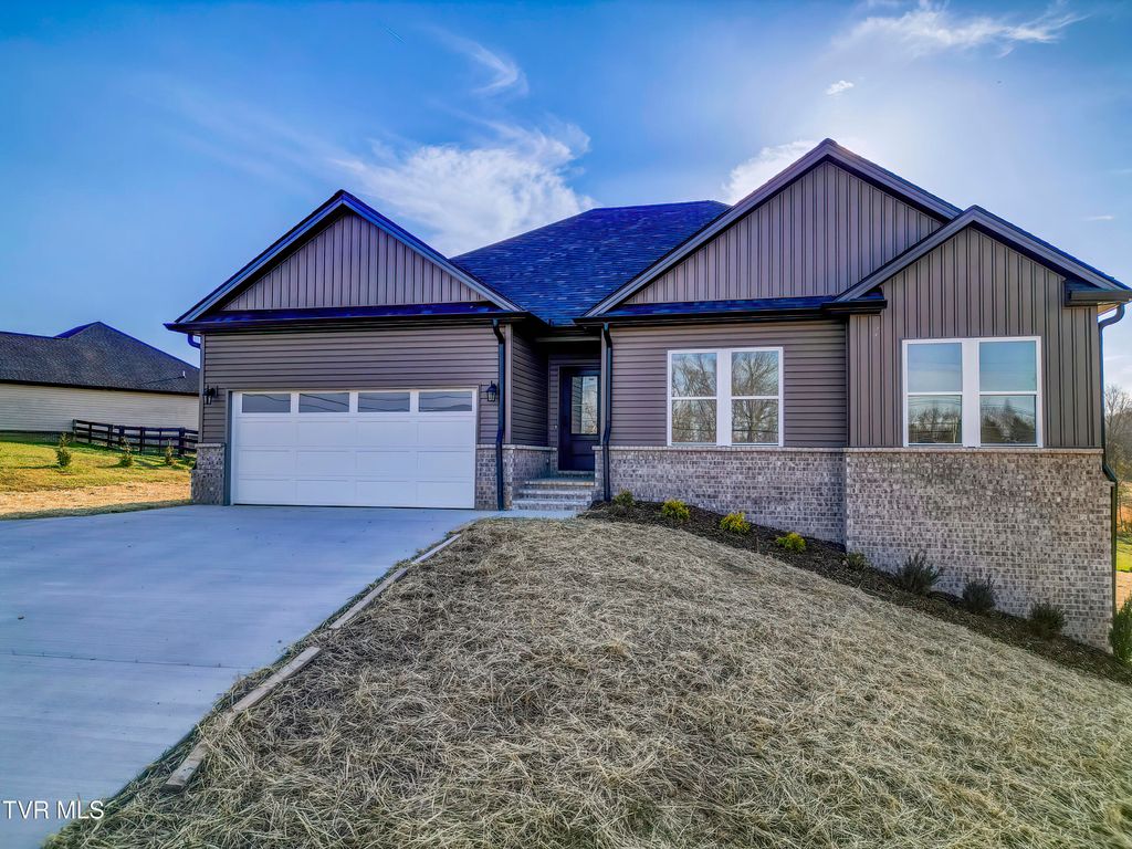 Photo of 943 Sugar Hollow Road, Piney Flats, TN 37686 (MLS # 9992230)