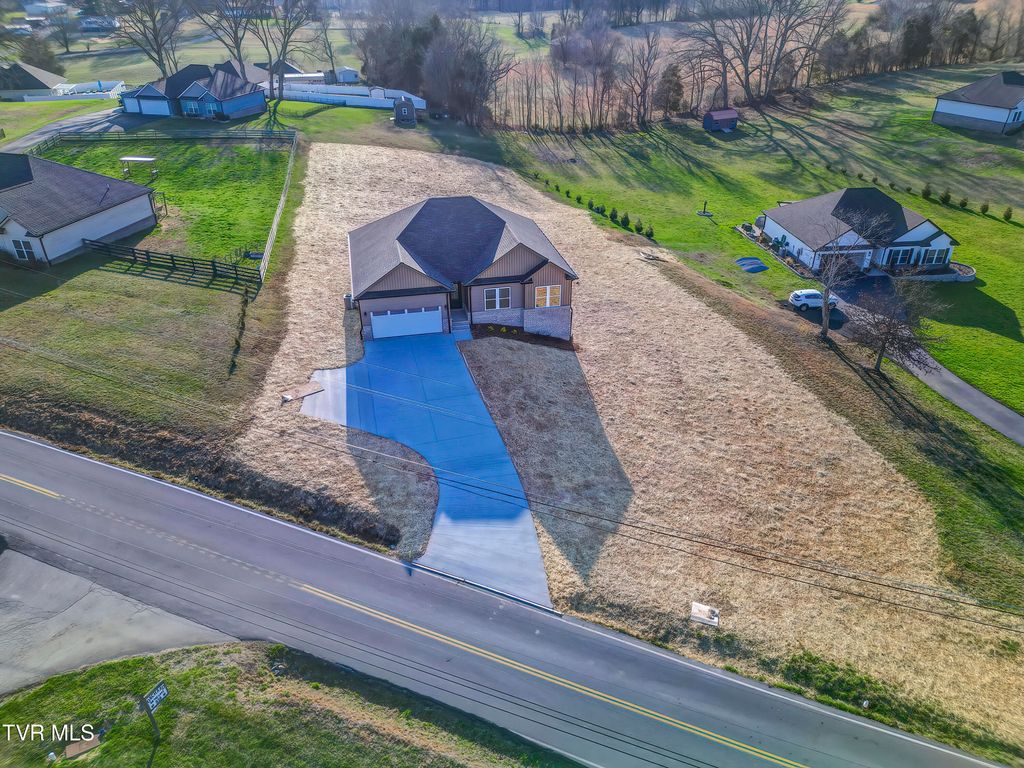 Photo of 943 Sugar Hollow Road, Piney Flats, TN 37686 (MLS # 9992230)