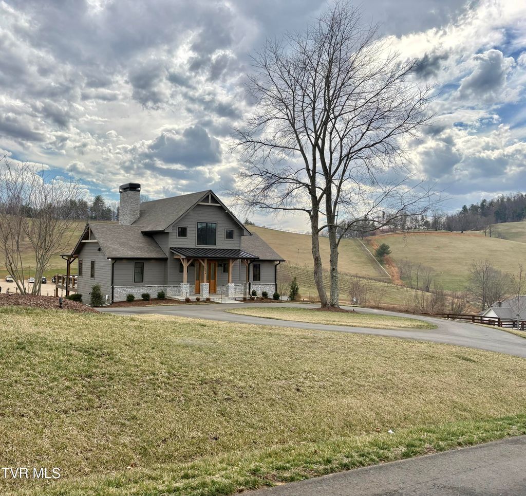 Photo of 136 Farmhouse Village Trail, Butler, TN 37640 (MLS # 9992472)