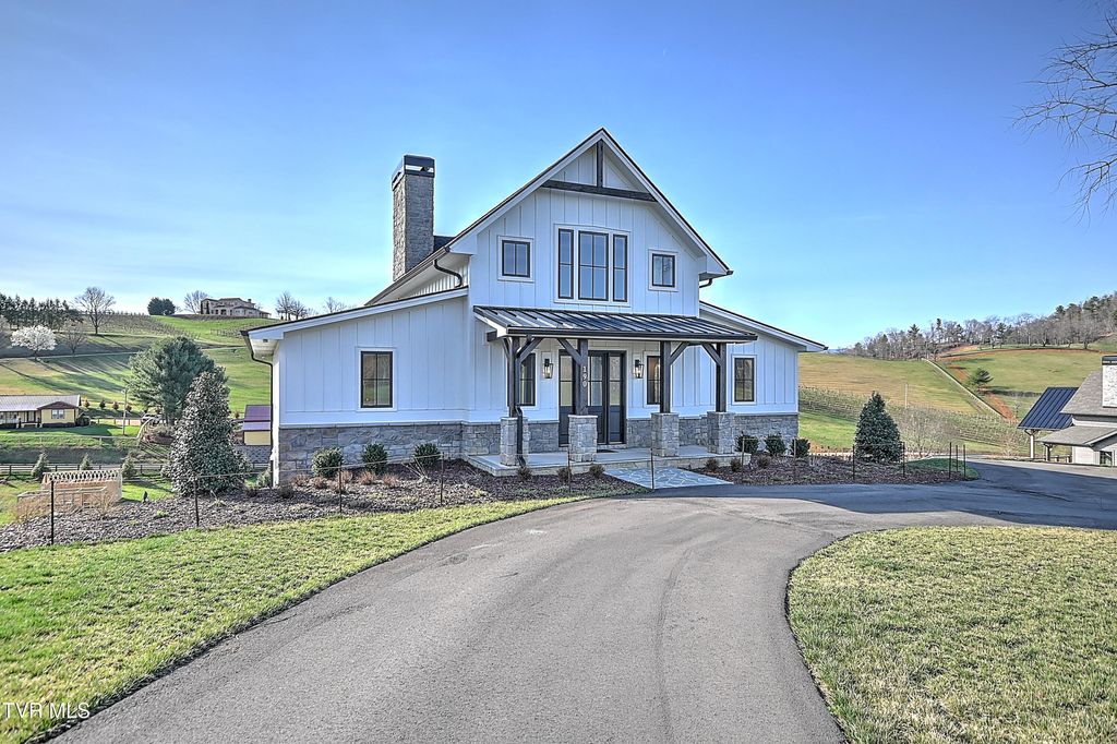 Photo of 190 Farmhouse Village Trail, Butler, TN 37640 (MLS # 9992477)