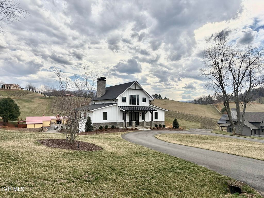 Photo of 190 Farmhouse Village Trail, Butler, TN 37640 (MLS # 9992477)