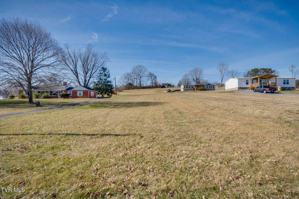 Photo of Tbd Weaver Pike, Bluff City, TN 37618 (MLS # 9990735)
