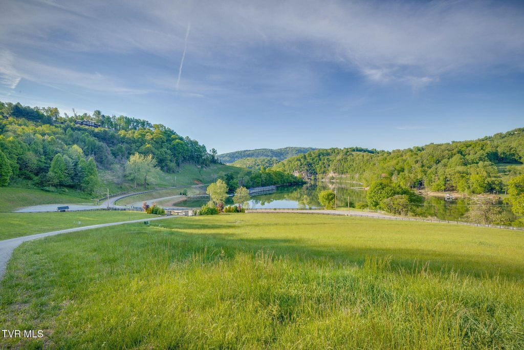 Photo of Tbd Cowan Town &amp; Eagle Ridge Pkwy Road, Butler, TN 37640 (MLS # 9994941)