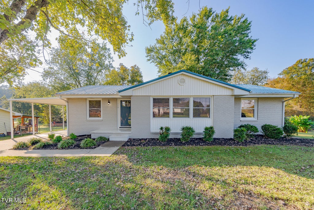 Photo of 115 Magnolia Street, Surgoinsville, TN 37873 (MLS # 10002239)
