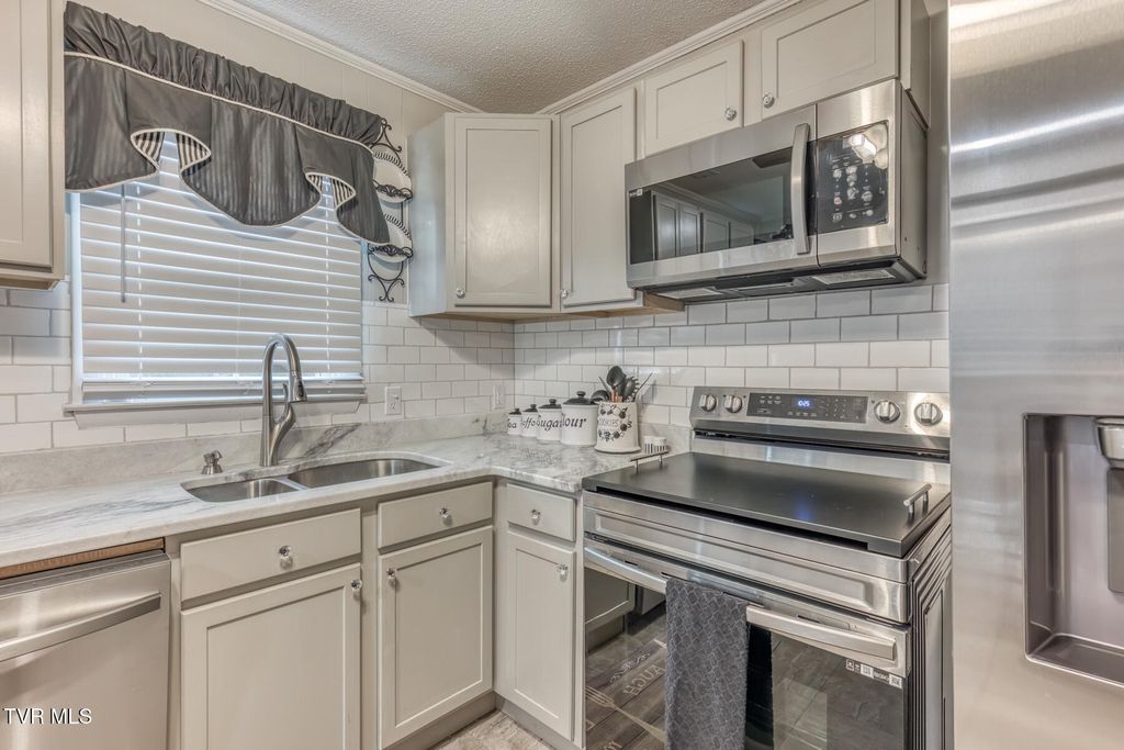 Photo of 502 Hospital Hill Road, Mountain City, TN 37683 (MLS # 9990749)