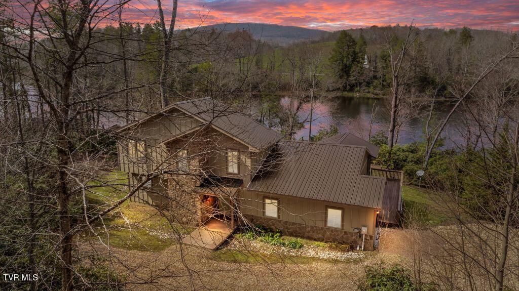 Photo of 342 Ripshin Lake Road, Roan Mountain, TN 37687 (MLS # 9993408)