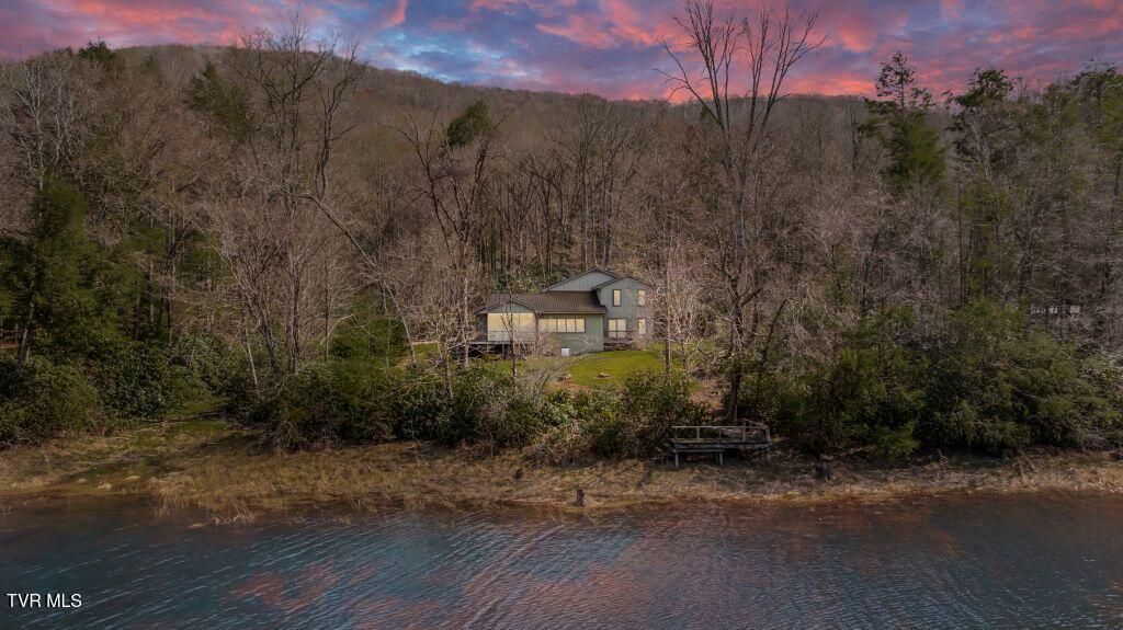 Photo of 342 Ripshin Lake Road, Roan Mountain, TN 37687 (MLS # 9993408)