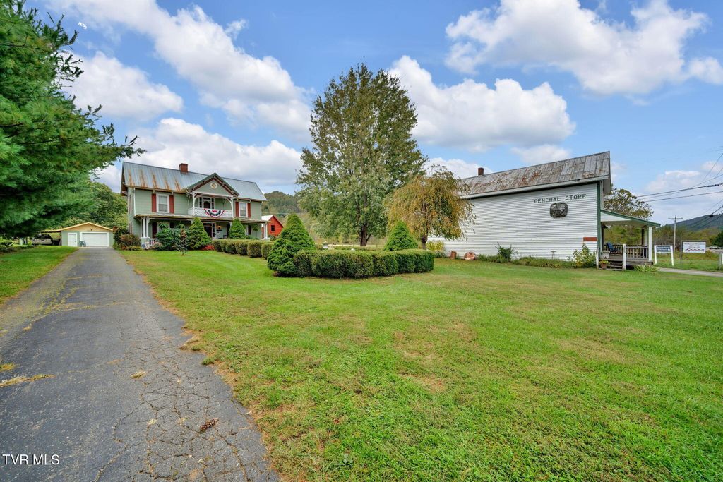 Photo of 8712 Highway 19-E, Roan Mountain, TN 37687 (MLS # 9990287)