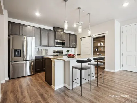 6153 N Ceylon Street Unit 303, Denver, CO MLS: 8721419