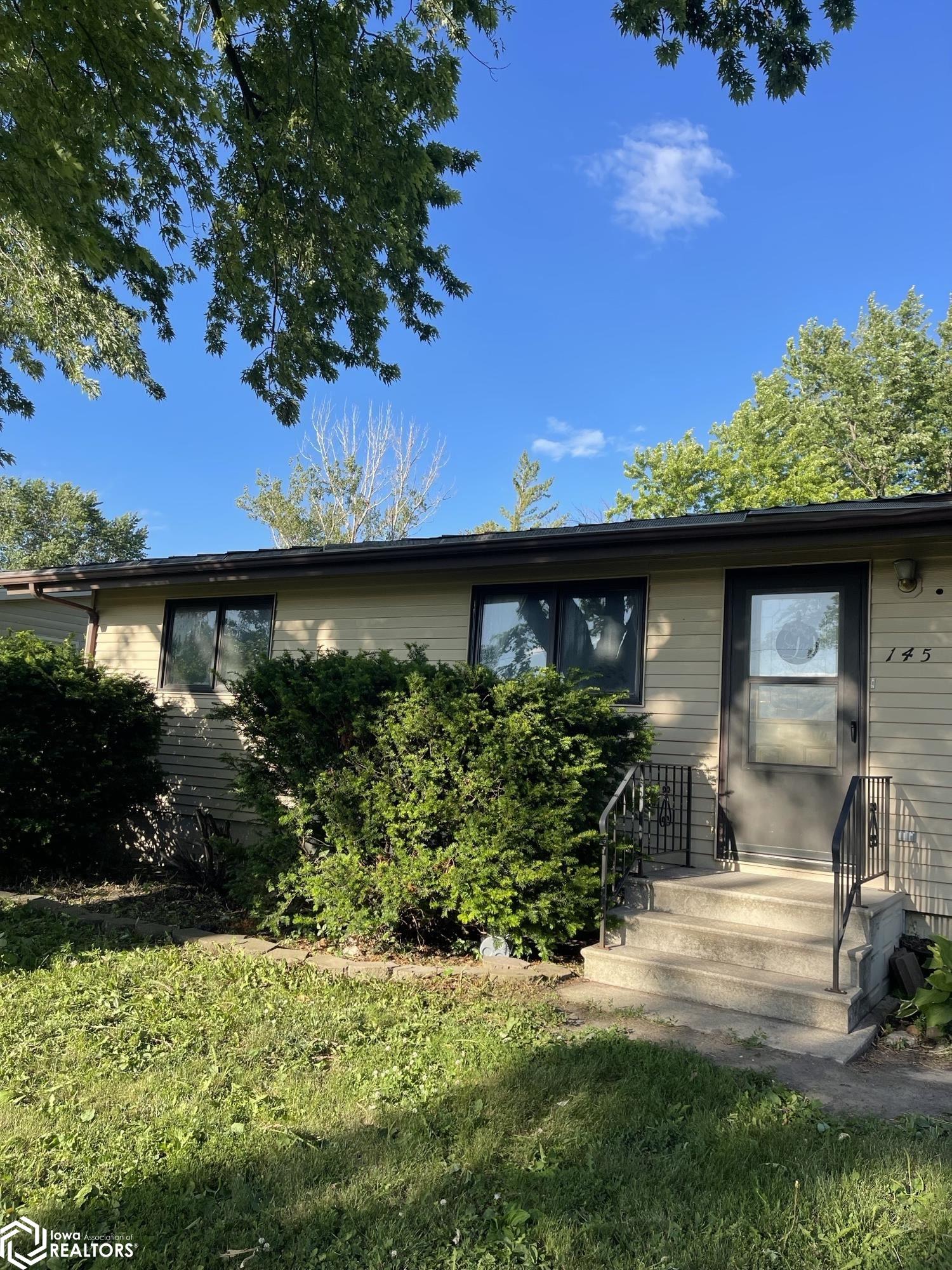 Photo 1 of 18 — 145 Grove Avenue, Garner, IA 50438