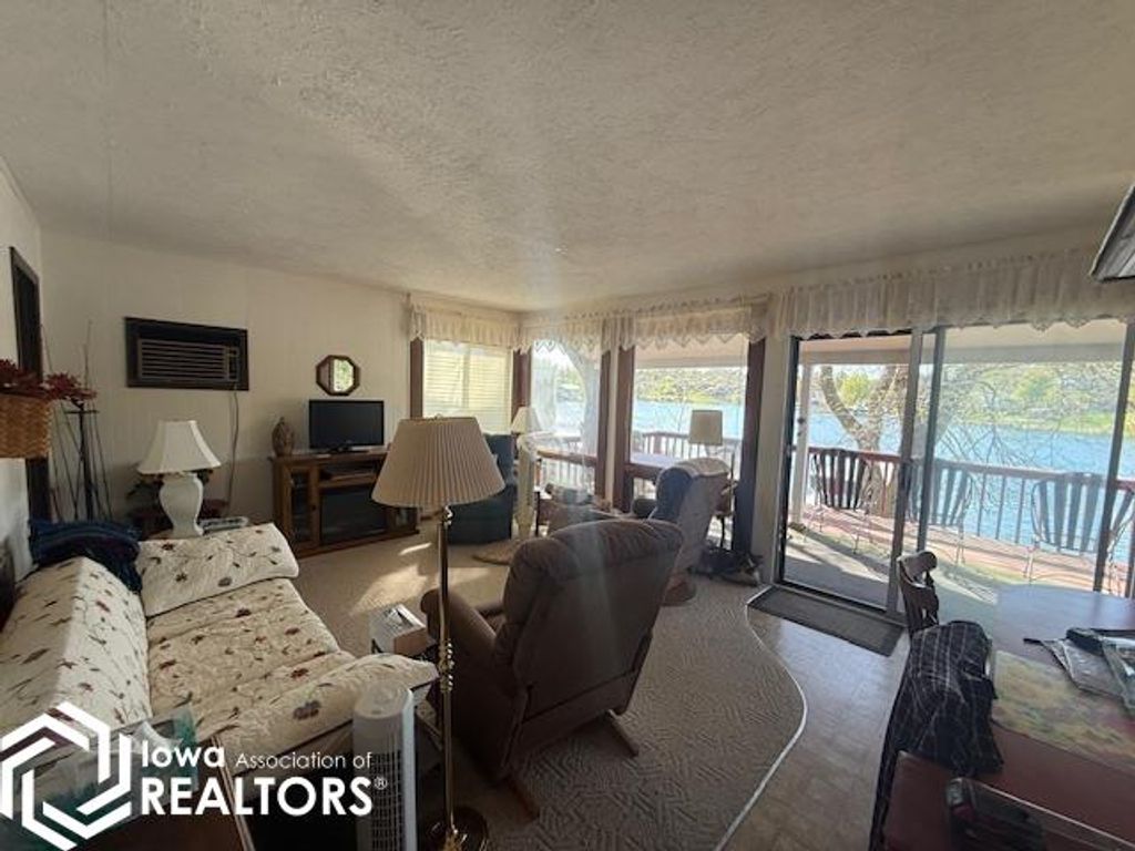 Photo of 1035 Lakeshore Drive, Brooklyn, IA 52211 (MLS # 6337489)