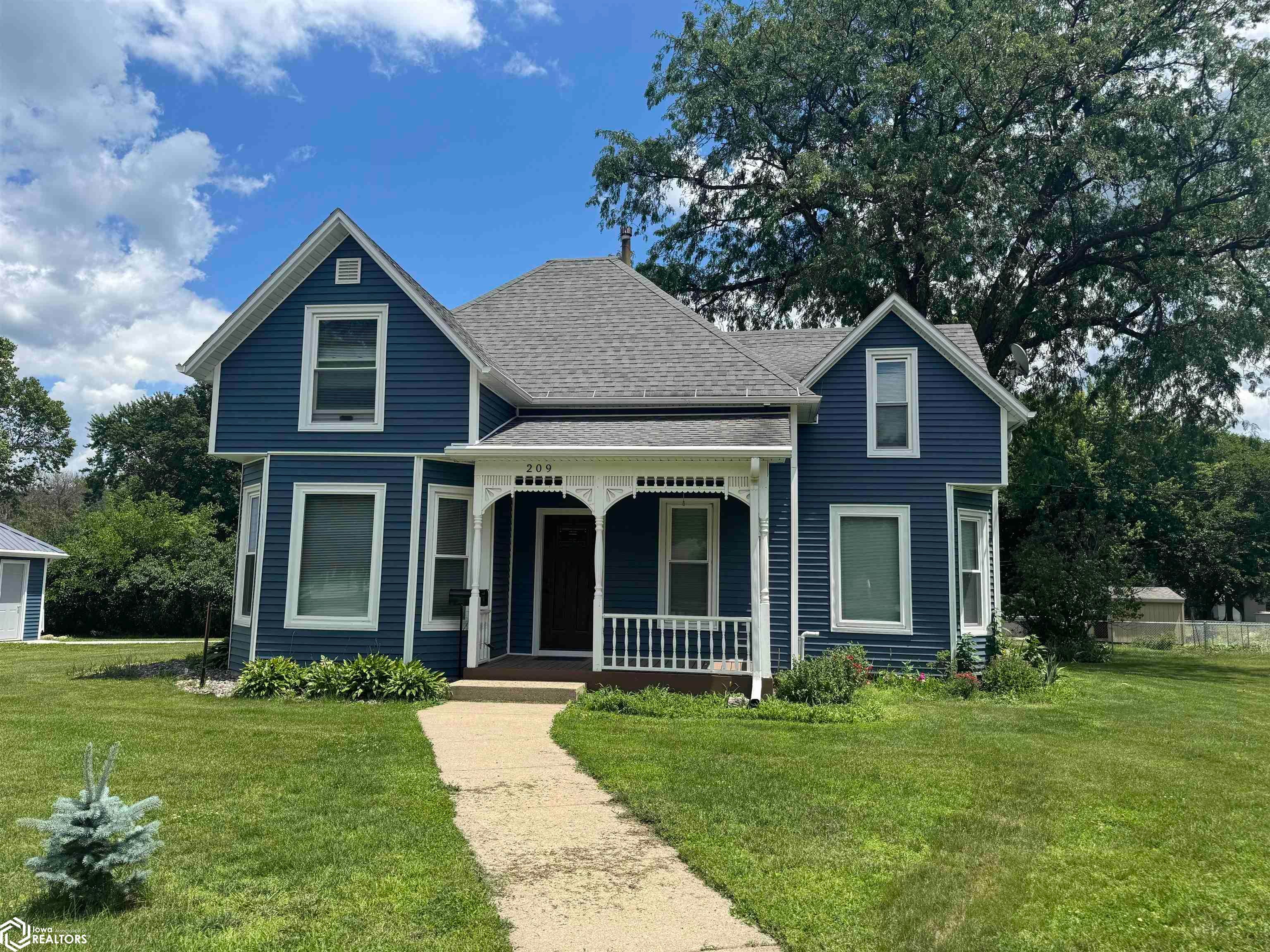 Photo 1 of 56 — 209 3rd Street N, Humboldt, IA 50548